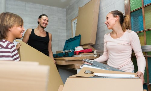 Professional man and van team loading furniture